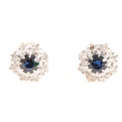 Lot 300 - A pair of sapphire and diamond earstuds.