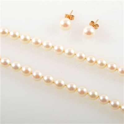 Lot 337 - A cultured pearl necklace and pair of stud earrings.