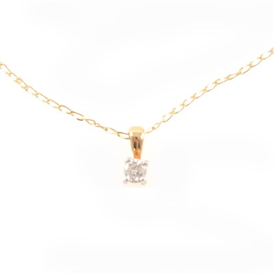 Lot 318 - A diamond solitaire pendant and chain.