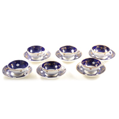 Lot 18 - A set of six Staffordshire porcelain cups and saucers, ...