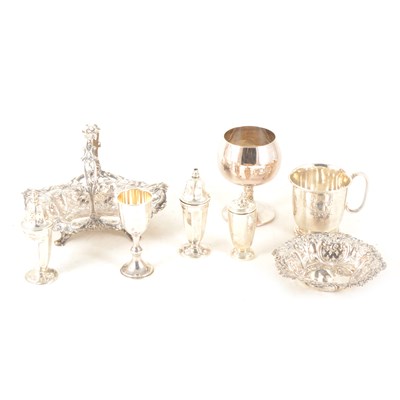 Lot 129 - A Sterling silver basket, HOward & Co, New York; and other silver items.