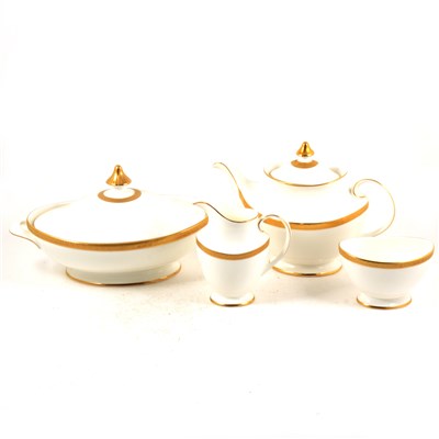Lot 187 - A Royal Doulton bone china dinner service, Royal Gold