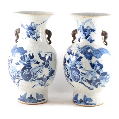 Lot 126 - A pair of Chinese crackle glaze blue and white vases, ...