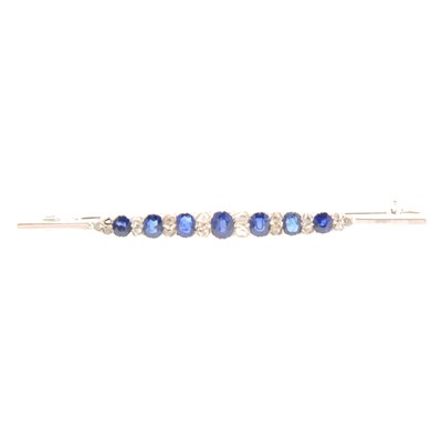 Lot 363 - A sapphire and diamond bar brooch.
