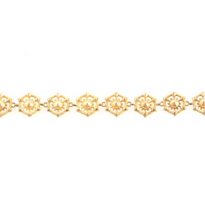 Lot 324 - A yellow metal bracelet, earrings and link