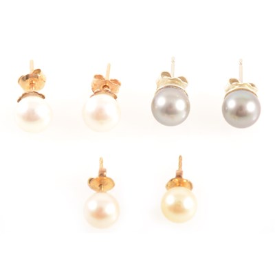 Lot 340 - A cultured pearl pendant and three pairs of pearl earrings with post and butterfly fittings