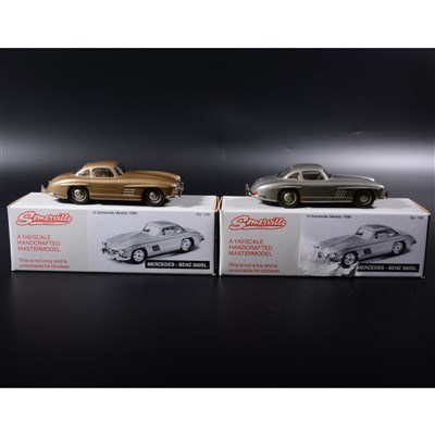 Lot 385 - Somerville 1:43 scale white metal models; two no.105 Mercedes-Benz 300SL, one in gold and one in silver, boxed.