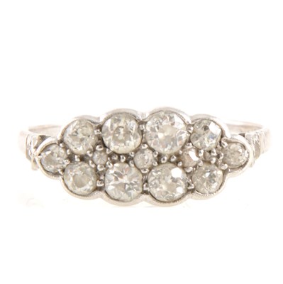 Lot 248 - A boat shape diamond cluster ring.