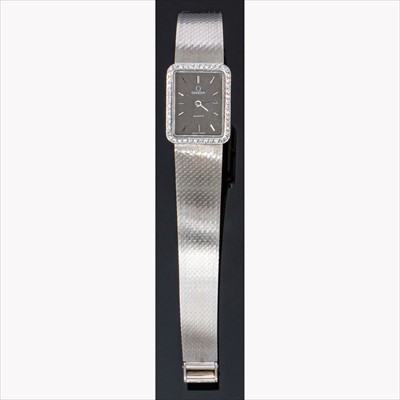 Lot 151 - Omega - a lady's 18 carat white gold bracelet watch.