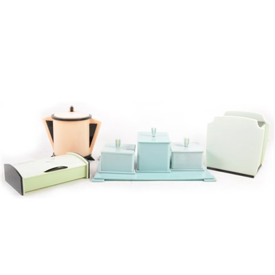 Lot 122 - An Art Deco bakelite dressing table set, two caddy's and a hinged box