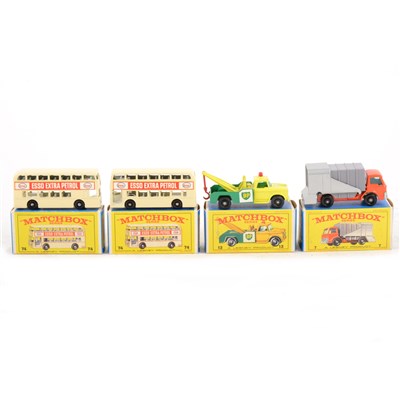 Lot 254 - Matchbox Toys; four die-cast models including (x2) no.74 Double Decker Buses, no.13 crane truck and no.7 refuse tipper, all boxed.
