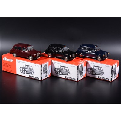 Lot 255 - Somerville 1:43 scale white metal models; three no.100A Austin FX4 taxis, in blue, black and maroon, boxed