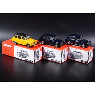 Lot 256 - Somerville 1:43 scale white metal models; three no.100A and no.100 Austin FX4 taxi, in blue, dark blue and yellow, boxed