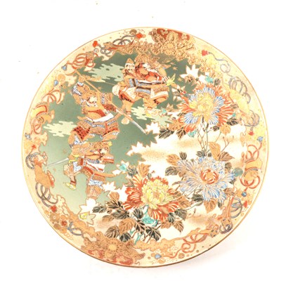 Lot 122 - Satsuma dish, decorated with warriors amongst...