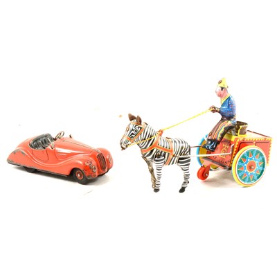 Lot 144 - A Schuco clockwork sports car and a tinplate...