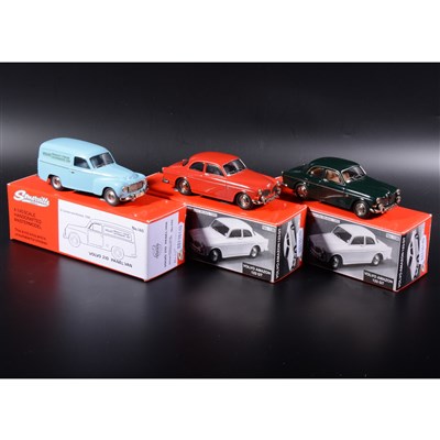 Lot 497 - Somerville 1:43 scale white metal models; two no.136 Volvo Amazon 123 GT in red and green, and a no.140 Volvo 210 Panel Van in blue, boxed.