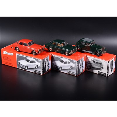 Lot 498 - Somerville 1:43 scale white metal models; two no.136 Volvo Amazon 123 GT in red and green, and a P-2 Rover 14 in green, boxed.