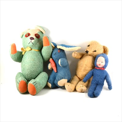 Lot 181 - Merrythought teddy bear, and soft toys in a suitcase.