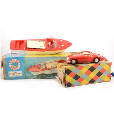 Lot 137 - Tri-ang battery operated MG model and Scalex speedboat model, both boxed.