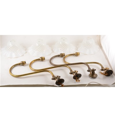 Lot 438 - A set of four brass wall brackets, ...