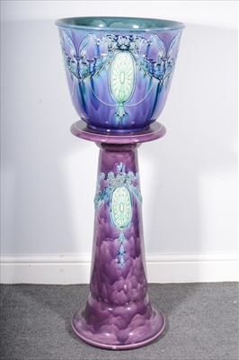 Lot 80 - A Continental pottery jardiniere on stand.