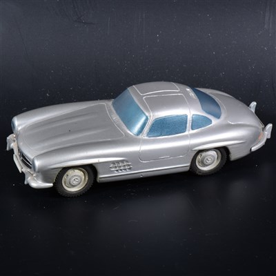 Lot 437 - A Somerville wooden mock-up prototype of the no.105 Mercedes 300SL, painted silver with rubber tyres, 10.5cm.