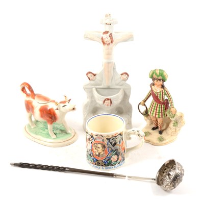 Lot 63 - A white metal toddy ladle, ...