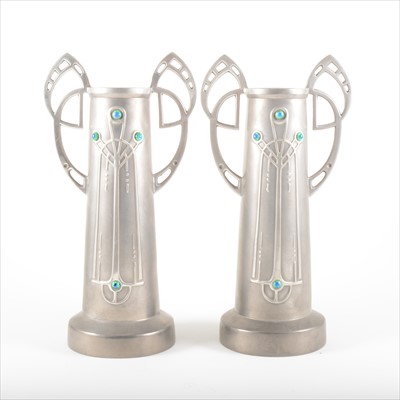 Lot 85 - A pair of Jugendstil pewter and enamel vases, probably Austrian, circa 1900.