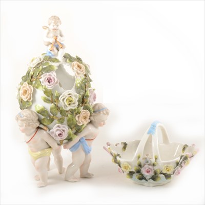 Lot 9 - Dresden table centre and a basket