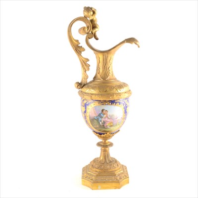 Lot 20 - Sevres style Bleu de Roi porcelain and gilt metal ewer