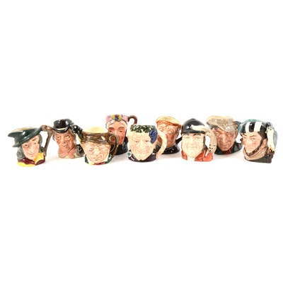 Lot 115 - Nineteen small Royal Doulton toby jugs and character jugs.