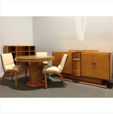 Lot 127 - An Art Deco satin wood dining room suite.