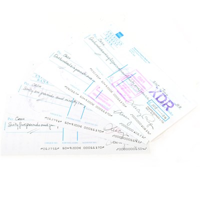 Lot 638 - George Harrison interest; Four used American Express cheques paid by Harrisongs Ltd in 1988
