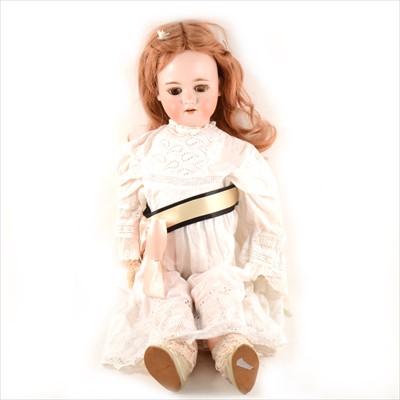 Lot 115 - A German type bisque head a doll, head stamp SP. I, with sleeping eyes, open mouth, composition body, 64cm