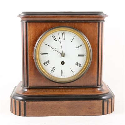 Lot 86 - A walnut and ebonised mantel clock, ...