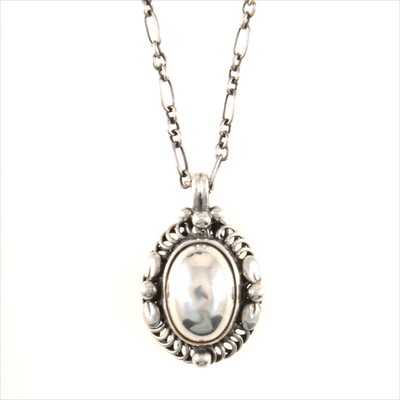 Lot 694 - Georg Jensen - a Heritage Collection pendant, chain and pair of matching earclips.