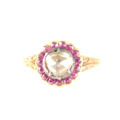 Lot 141 - An old rose cut diamond and pink stone cluster ring.