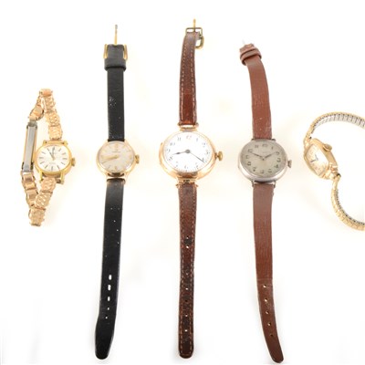 Lot 205 - A lady's gold Omega watch, two other gold case watches, a Tissot gold-plated wrist watch.