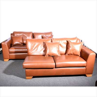 Lot 286 - A large contemporary four-seat leather sofa, retailed by Heals.