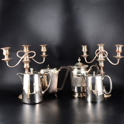Lot 47A - A pair of silver-plated three-light table candelabra, ...