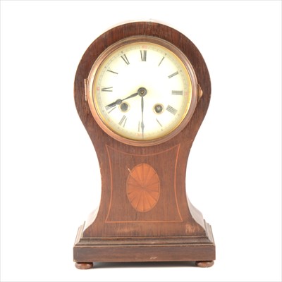 Lot 102 - An Edwardian 8 day inlaid balloon shaped mantel clock