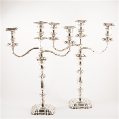 Lot 643 - Pair of Edwardian silver three-light candelabra, Fordham & Faulkner, Sheffield 1906; and a very similar pair.