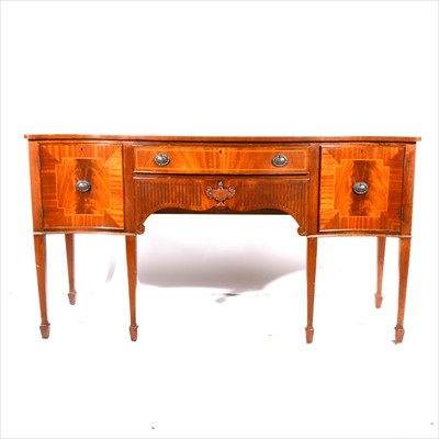 Lot 337 - A reproduction mahogany serpentine sideboard, in the style of Robert Adam
