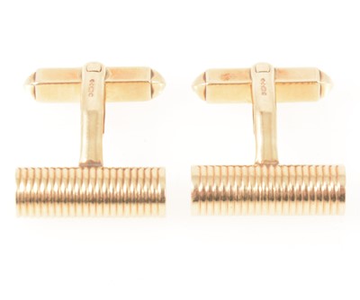 Lot 137 - A pair of 9 carat yellow gold cylindrical cufflinks.