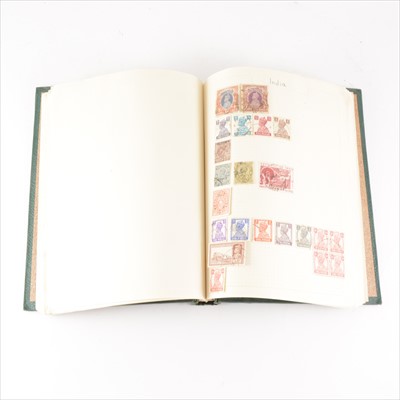 Lot 128 - Small worldwide stamp collection in a single green album.