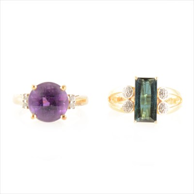 Lot 202A - A "Uruguayan" amethyst and diamond ring, and a tourmaline and clear stone ring.