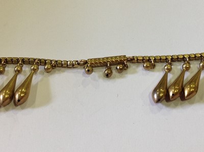 Lot 106 - A late 19th Century yellow metal fringe necklace.