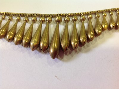 Lot 106 - A late 19th Century yellow metal fringe necklace.