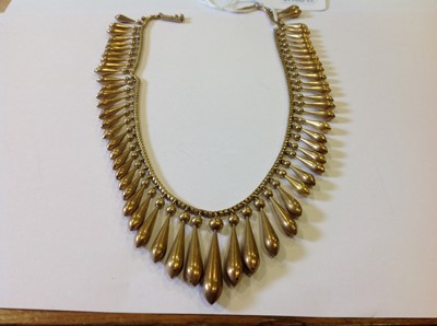 Lot 106 - A late 19th Century yellow metal fringe necklace.
