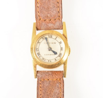 Lot 150 - Cartier - a lady's 18 carat yellow gold wrist watch.